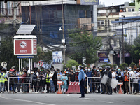 Armed Police Force (APF) and Nepal Police guard around the chariot procession of idol Rato Machindranath and lord Minnath at Pulchowk, Lalit...