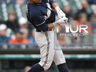 Milwaukee Brewers' Khris Davis hits a single in the second inning of a baseball game against the Detroit Tigers in Detroit, Michigan USA, on...