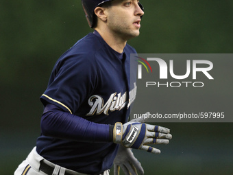 Milwaukee Brewers' Ryan Braun round the bases after his solo home run in the fourth inning of a baseball game against the Detroit Tigers in...