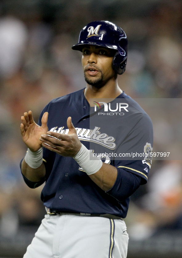 Milwaukee Brewers' Khris Davis scores a run in the seventh inning of a baseball game against the Detroit Tigers in Detroit, Michigan USA, on...