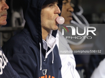 Detroit Tigers pitcher Shane Greene sits in the dugout during the eighth inning of a baseball game against the Milwaukee Brewers in Detroit,...