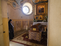 A nun prays next to Cardinal Marian Jaworski's coffin ahead of the funeral mass inside the Bernardine monastery in Kalwaria Zebrzydowska.
On...