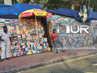 Heaps of used books for sake along the roadside in the city of Thiruvananthapuram (Trivandrum), Kerala, India. (