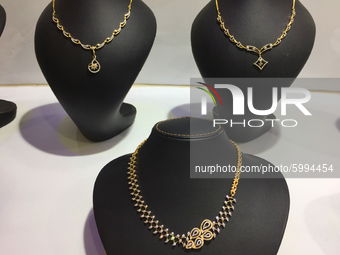 Gold and diamond necklaces displayed at a jewelry shop in the city of Thiruvananthapuram (Trivandrum), Kerala, India. (