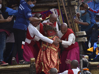 Nepalese Priests takes out idol Rato Machindranath from the chariot on a last day at Pulchowk, Lalitpur, Nepal on Monday, September 14, 2020...