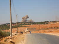 Smoke rises as a result of Russian air strikes on Patenta, west of the city of Maarat Misrin in Idlib countryside in the northwestern govern...