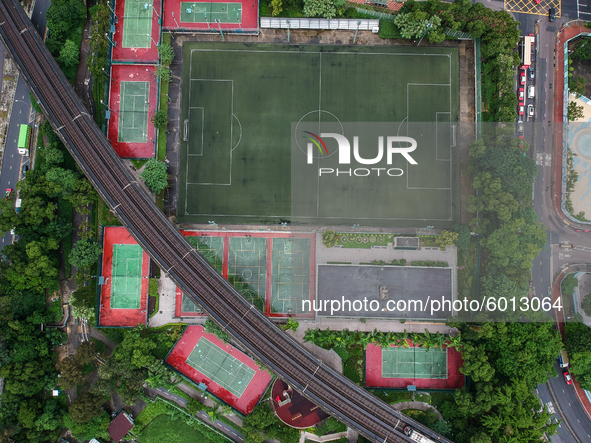 This Aerial Photograph showing closed tennis courts, basketball courts and football court on September 19, 2020 in Hong Kong, China.  