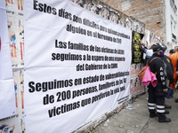 Members of a rescue group placed a sign outside where the Alvaro Obregon 286 building was located on September 19, 2020, in Mexico City, Mex...