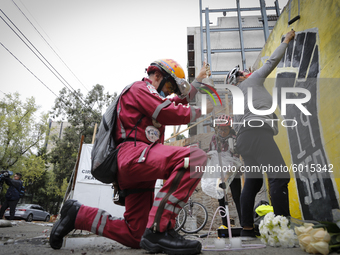 Sony, member of the rescue group Topos ADN poses for a portrait outside where the Alvaro Obregon 286 building was located on September 19, 2...