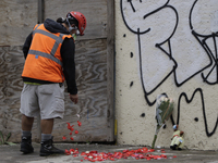 Rescuer visits the Rébsamen School in Mexico City to mount an offering, where 21 minors died after the collapse of a property during the ear...