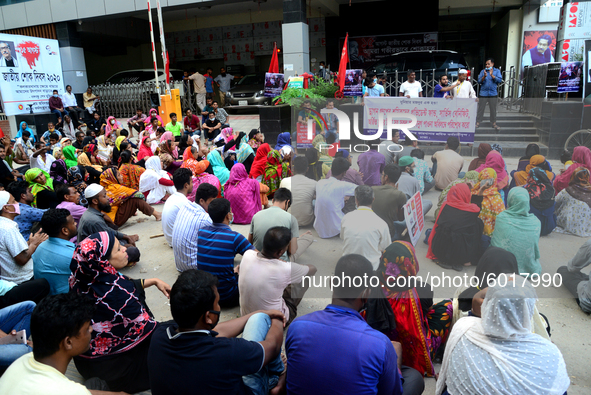 Garments workers of Dragon Group stage a demonstration in front of Department of Labor building demanding their due payment in Dhaka, Bangla...