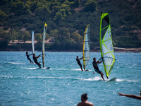 Windsurfers enjoying the windy weather at Anavyssos beach, near Athens. In Athens, Greece, on September 20, 2020. (