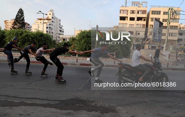 Young Palestinians roller skate amid the ongoing COVID-19 pandemic, in Gaza City, Gaza Strip,  on September 20, 2020. The Gaza Strip has bee...