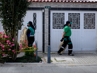Mr. Botache and Mrs. Stella, during a work day on the recycling route in the town of San Cristóbal, in Bogota, Colombia on September 9, 2020...