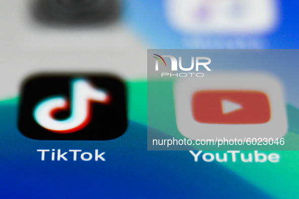 TikTok and YouTube apps icons are seen on a phone screen in this illustration photo taken on September 22, 2020 in Krakow, Poland. YouTube i...
