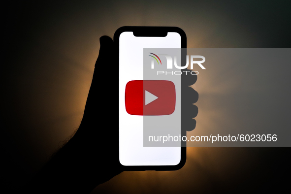 YouTube logo is seen displayed on a phone screen in this illustration photo taken on September 22, 2020 in Krakow, Poland. YouTube introduce...