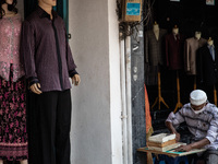 An old coin seller with empty store at Pasar Baru-Central Jakarta on 24 September 2020. Jakarta's return to stricter social-distancing measu...