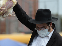 A religious Jews in Crown Heights, Brooklyn, US, on September 24, 2020 perform kaparot ritual. Many Orthodox Jews perform the age-old tradit...
