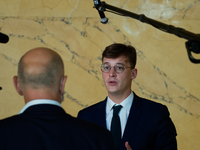  French menber of Parliament Sacha Houlie speaks with journalists and  leaves the session of questions to the government at the French Natio...