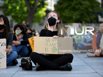 A protester hold a placard reading `There is no planet B?during the Global Climate Action Day event in Madrid, Spain on 25th September, 2020...