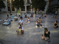 Protesters are seen during a pacific concentration in Plaza del Carmen Square on September 25, 2020 in Granada, Spain. Following the call of...