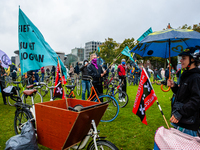 Climate activists and students are seen gathering with their bikes at the Museumplein during the Global Climate Strike, in Amsterdam, on Sep...