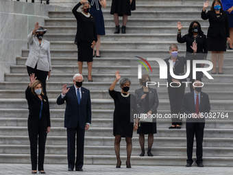 Female legislators wave as the casket of the late Supreme Court Associate Justice Ruth Bader Ginsburg is driven away from the U.S. Capitolon...