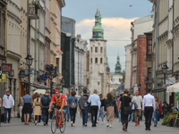 A crowded Grodzka Street in Krakow's Old town with people walking without wearing protective masks, on Friday, September 25.
The number infe...