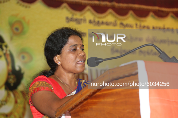Woman speaks during a special cultural program featuring Tamil children who were orphaned during the civil war in Jaffna, Sri Lanka, on Augu...