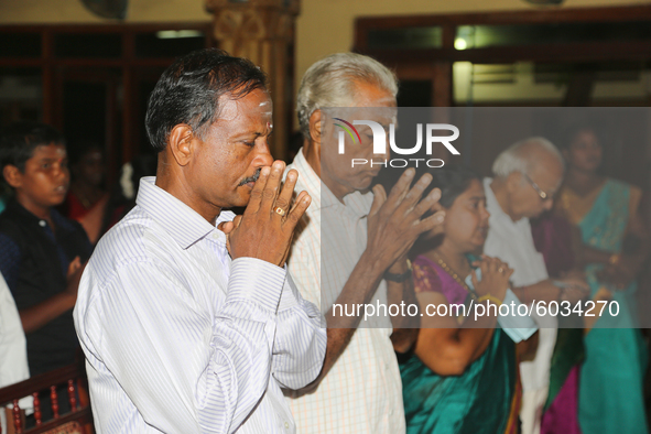 Tamils pray for all those killed during the civil war during a special cultural program featuring children who were orphaned during the civi...