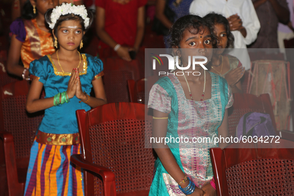 Tamil children who were orphaned during the civil war pray for all those who were killed during a cultural program in Jaffna, Sri Lanka, on...