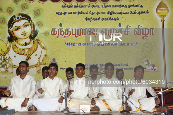 Tamil children who were orphaned during the civil war perform a classical song in the traditional Carnatic style of music during a cultural...