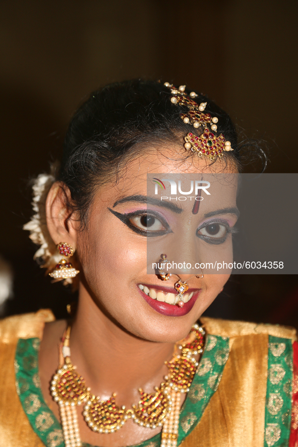 Tamil girl dressed in traditional attire waits to perform a Bharathnatyam dance during a special cultural program featuring Tamil children w...