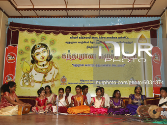 Tamil children who were orphaned during the civil war perform a classical song in the traditional Carnatic style of music during a cultural...
