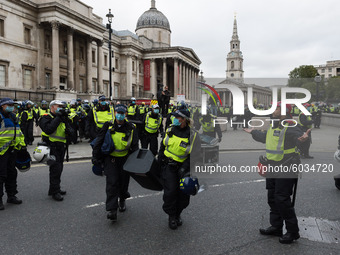  Police removes the soundsystem from Trafalgar Square after Unite for Freedom rally which was held to protest against the restrictions impos...