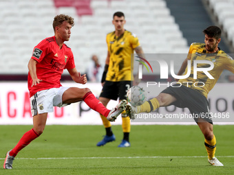 Luca Waldschmidt of SL Benfica (L) vies with Fabio Pacheco of Moreirense FC (R ) during the Portuguese League football match between SL Benf...