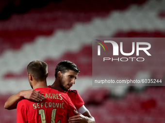 Haris Seferovic of SL Benfica (L ) celebrates with Ruben Dias after scoring during the Portuguese League football match between SL Benfica a...