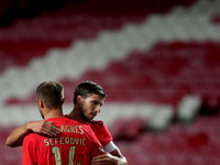 Haris Seferovic of SL Benfica (L ) celebrates with Ruben Dias after scoring during the Portuguese League football match between SL Benfica a...