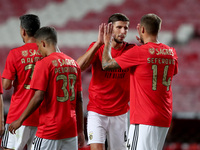 Haris Seferovic of SL Benfica (R ) celebrates with Ruben Dias after scoring during the Portuguese League football match between SL Benfica a...