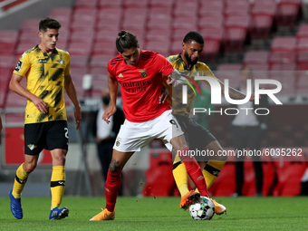 Darwin Nunez of SL Benfica (C ) vies with Anthony DAlberto of Moreirense FC (R ) during the Portuguese League football match between SL Benf...
