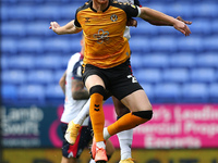  Newports Ryan Taylor clashes with Boltons Liam Gordon  during the Sky Bet League 2 match between Bolton Wanderers and Newport County at the...