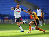  Boltons Tom White battles with Newports Liam Sheppard  during the Sky Bet League 2 match between Bolton Wanderers and Newport County at the...
