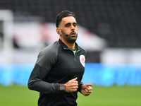  
Assistant referee, Bhupinder Gill warms up ahead of kick-off during the Sky Bet Championship match between Derby County and Blackburn Rov...