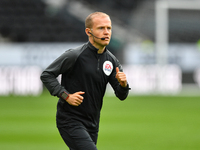  
Assistant referee, Rob Smith warms up ahead of kick-off during the Sky Bet Championship match between Derby County and Blackburn Rovers a...