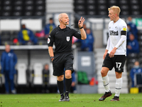  
Referee Andy Woolmer has words with Louie Sibley of Derby County during the Sky Bet Championship match between Derby County and Blackburn...