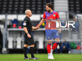  
Referee Andy Woolmer and Ben Brereton of Blackburn Rovers during the Sky Bet Championship match between Derby County and Blackburn Rovers...
