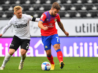  
Adam Armstrong of Blackburn Rovers battles with Kamil Jozwiak of Derby County during the Sky Bet Championship match between Derby County...