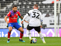  
Wayne Rooney of Derby County lines up a shot at goal during the Sky Bet Championship match between Derby County and Blackburn Rovers at t...