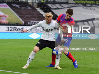  
Kamil Jozwiak of Derby County battles with Darragh Lenihan of Blackburn Rovers during the Sky Bet Championship match between Derby County...
