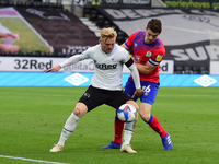  
Kamil Jozwiak of Derby County battles with Darragh Lenihan of Blackburn Rovers during the Sky Bet Championship match between Derby County...